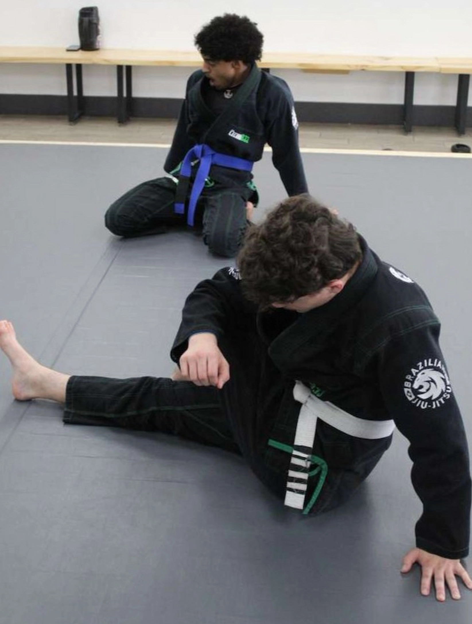 Students practicing foundational Brazilian Jiu-Jitsu techniques at Ceconi BJJ Cypress